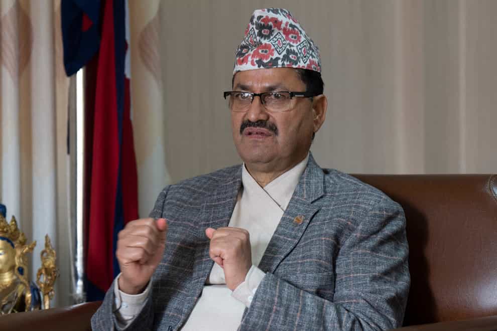 Nepal’s Foreign Minister Narayan Prakash Saud says Nepal has asked Russia to send back hundreds of Nepali nationals who have been recruited to fight against Ukraine and repatriate the bodies of those who were killed in the conflict (AP Photo/Niranjan Shrestha)