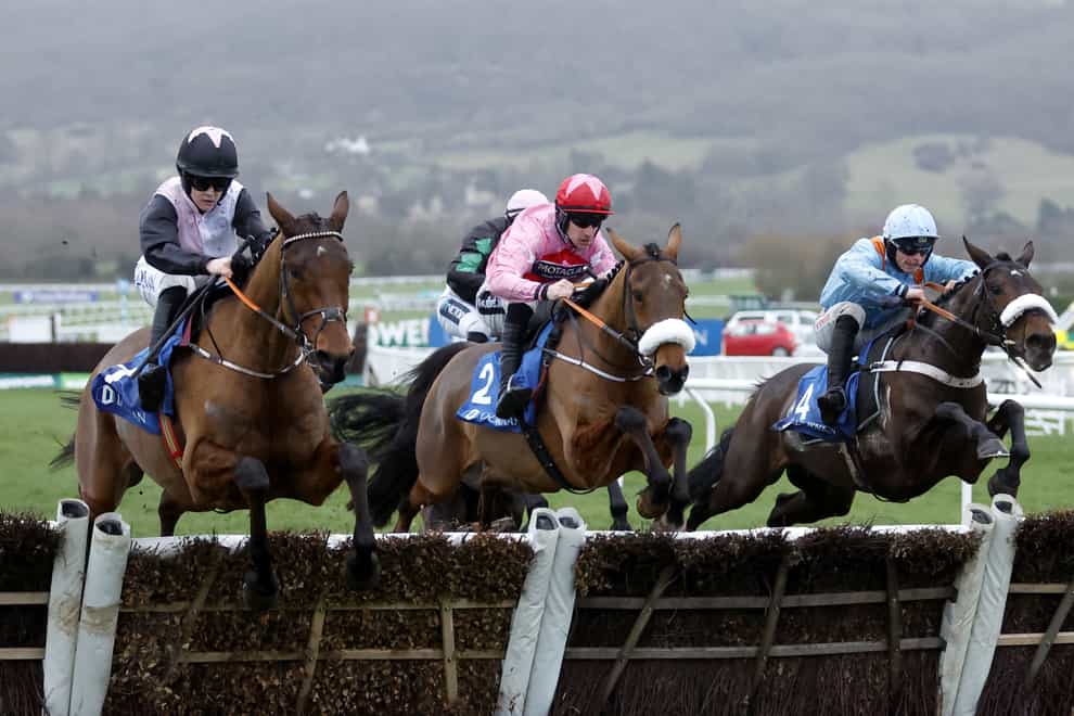 Bob Olinger (left) on his way to winning the Relkeel Hurdle (Nigel French/PA)