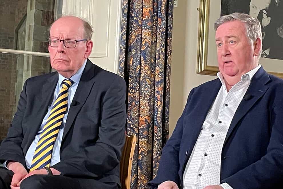 Veteran journalists Ken Reid (left) and Stephen Grimason (right) were honoured by the Queen’s University Belfast for services to journalism (Rebecca Black/PA)