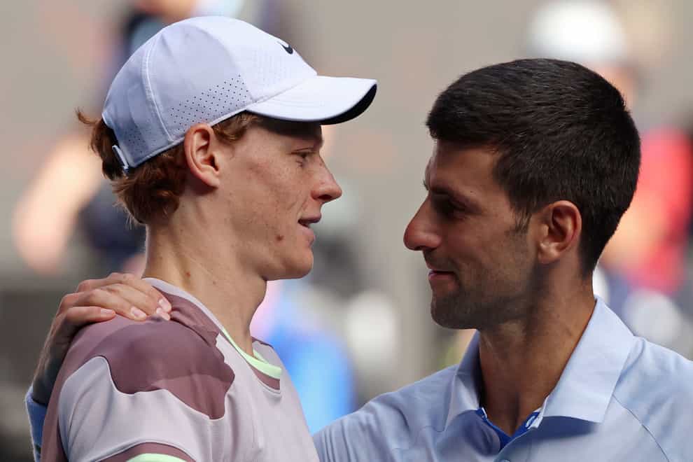 Jannik Sinner, left, is congratulated by Novak Djokovic (Asanka Brendon Ratnayake/AP)