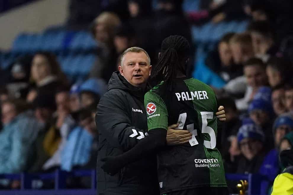 Mark Robins has offered support to Kasey Palmer (Martin Rickett/PA)