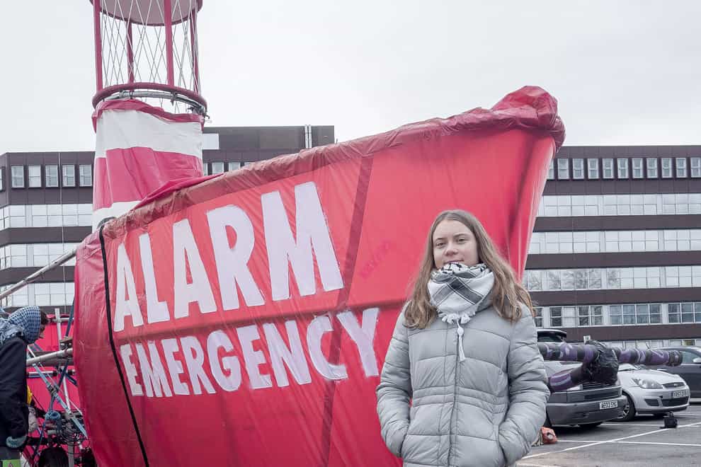 Greta Thunberg joined residents and campaigners marching from Farnborough town centre to the airport (Extinction Rebellion/PA)