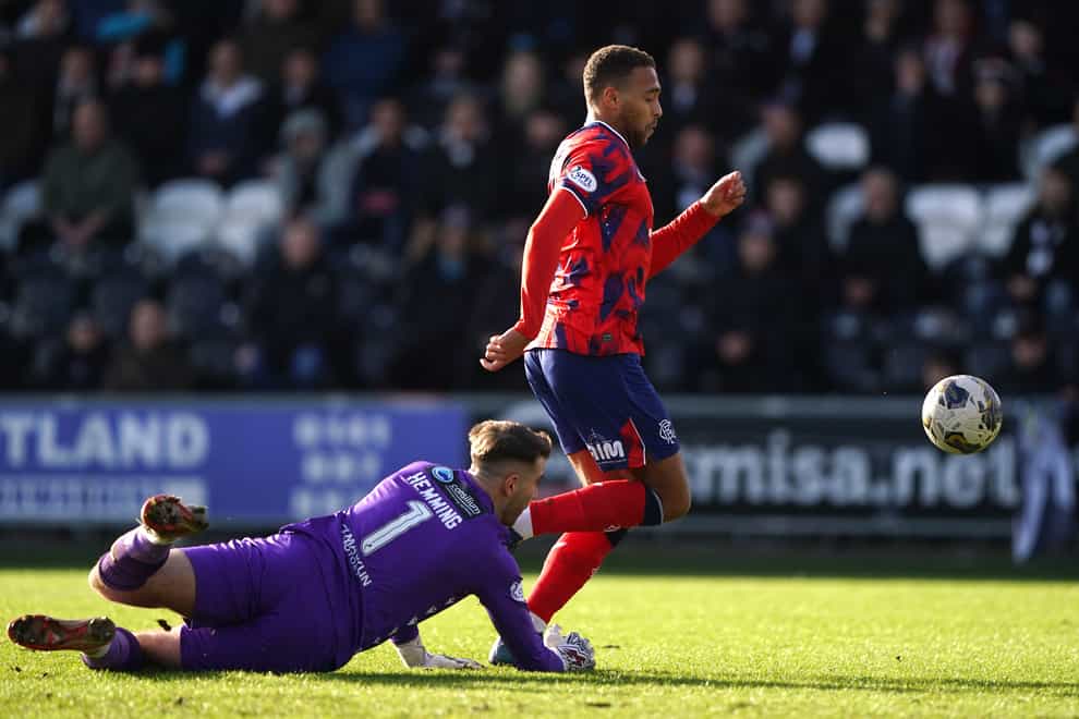 Rangers’ Cyriel Dessers, right, scores against St Mirren (Andrew Milligan/PA)
