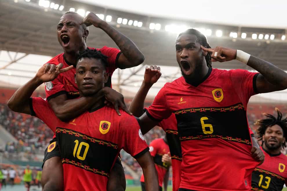 Angola celebrated another memorable performance as they reached the last eight in the Ivory Coast (Themba Hadebe/AP)