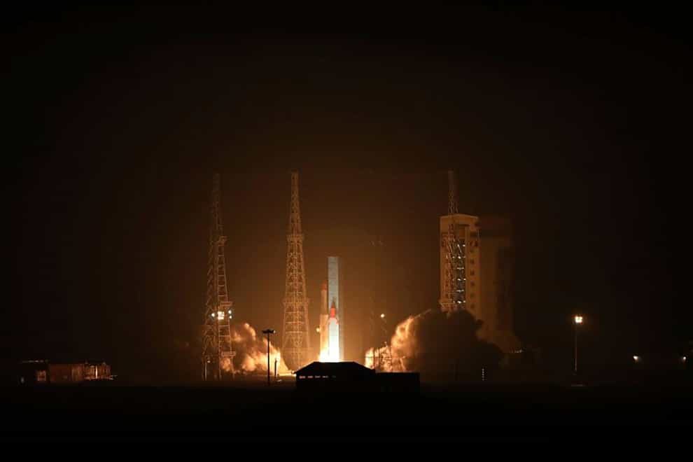 Iran said it has successfully launched three satellites into space (Iranian Defence Ministry/AP)