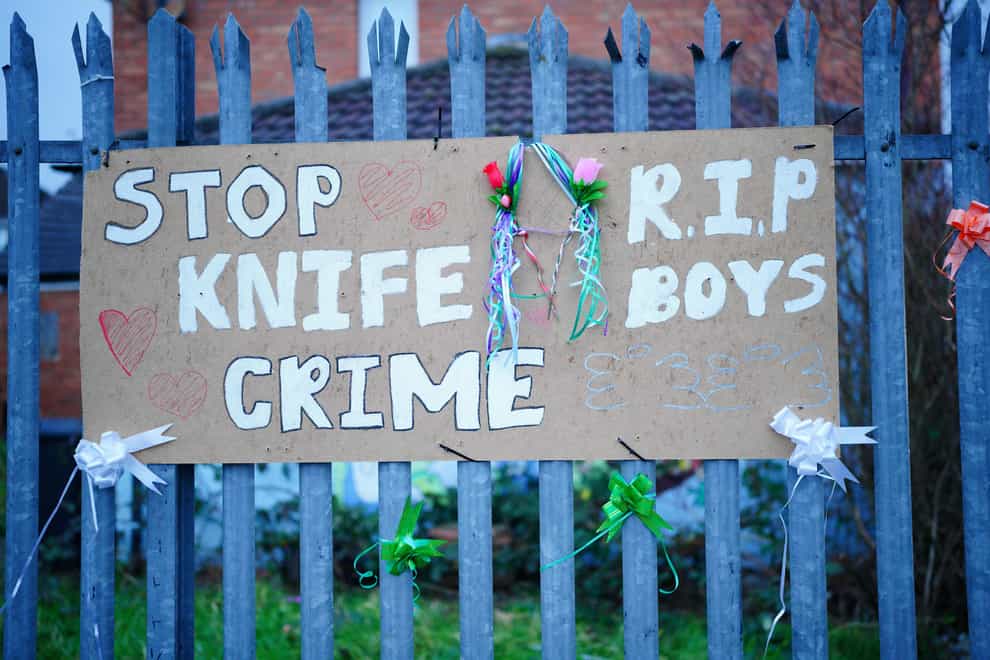 A sign near to the scene in south Bristol where two teenage boys, aged 15 and 16, died after a stabbing attack by a group of people who fled the scene in a car (Ben Birchall/PA)