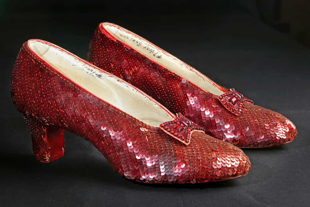 The sequin-covered ruby slippers worn by Judy Garland in The Wizard Of Oz (Reed Saxon/AP)