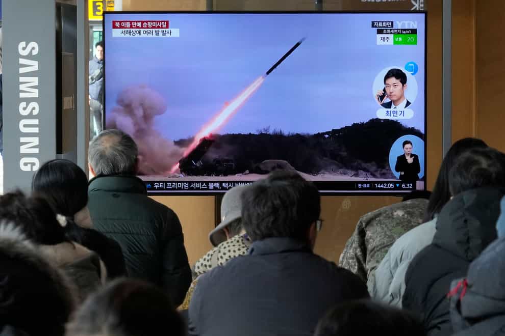 A TV screen shows a file image of North Korea’s missile launch during a news programme at the Seoul Railway Station in South Korea on Tuesday (Ahn Young-joon/AP)