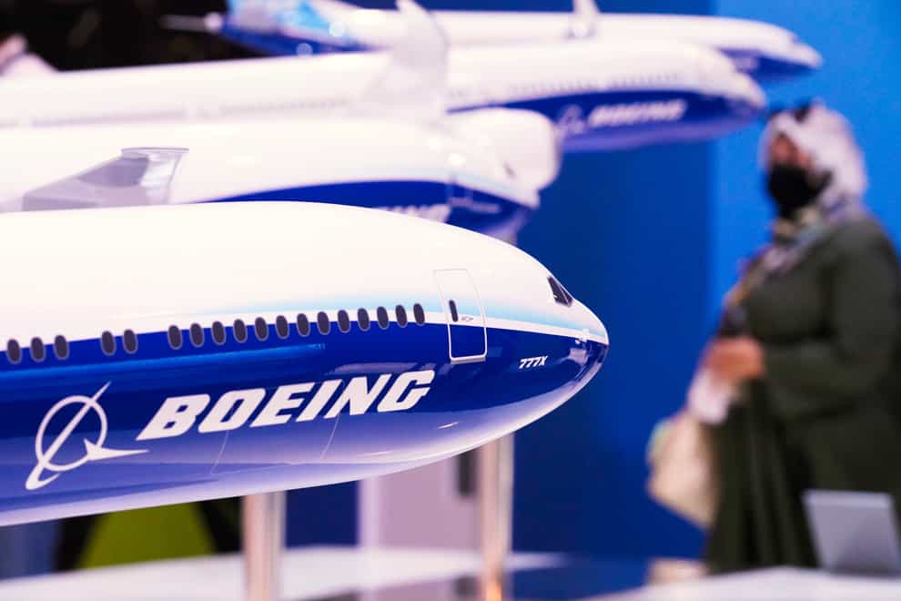 Boeing said that excluding one-time items, it lost 47 cents (37p) per share (Jon Gambrell/AP)