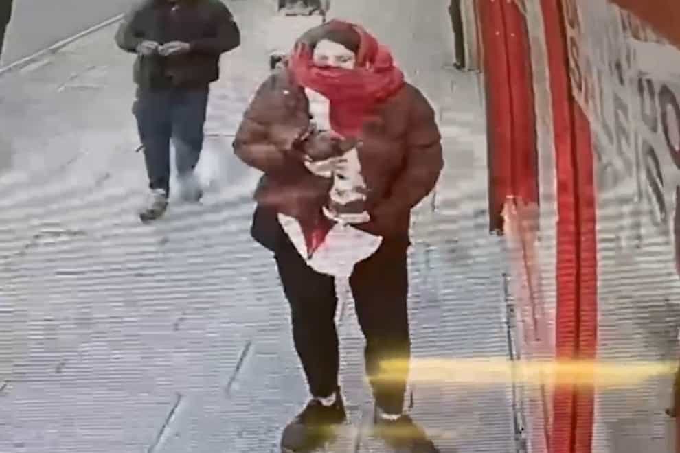 CCTV footage of Constance Marten holding baby Victoria under her coat outside Special Connection in East Ham, London, which was shown in court during her and Mark Gordon’s trial at the Old Bailey (Metropolitan Police/PA)
