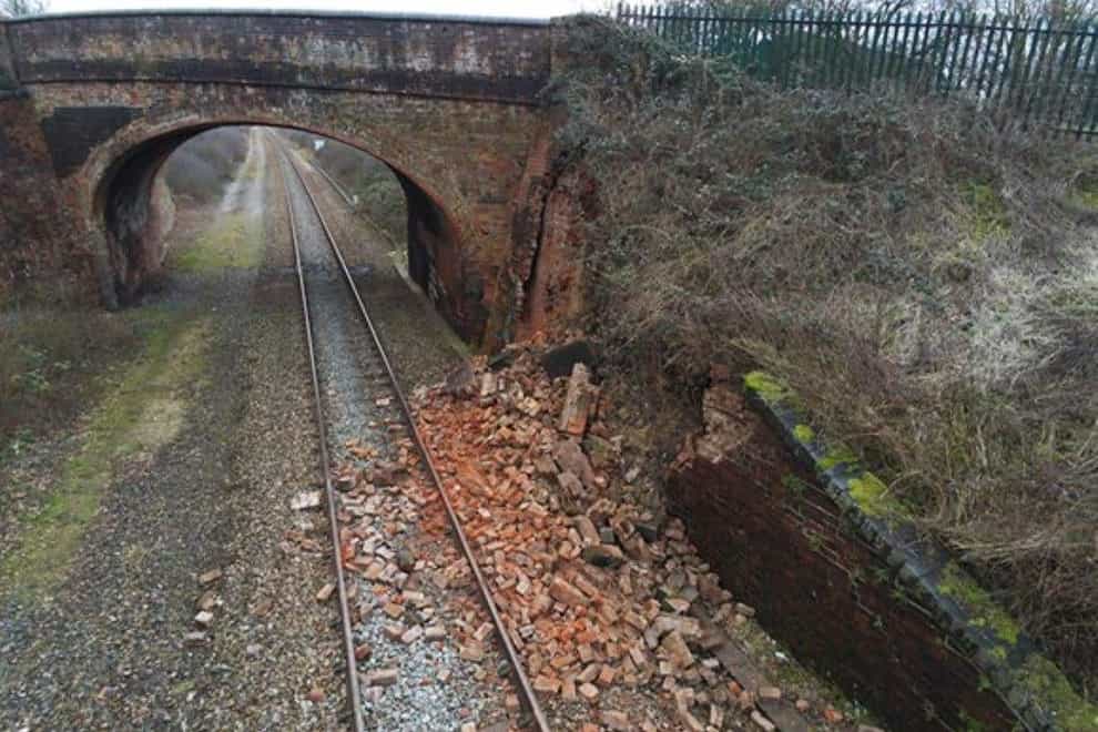 Four safety recommendations have been made to Network Rail after a train hit a pile of bricks from a collapsed wall (RAIB/PA)