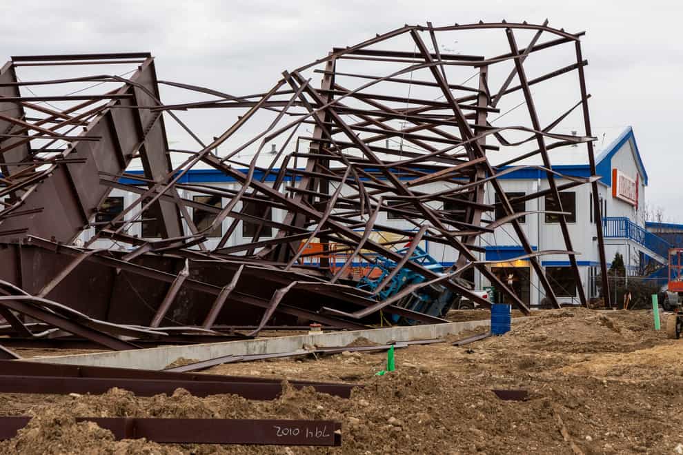 Twisted girders and debris cover the ground from the collapse (Darin Oswald /Idaho Statesman/AP)