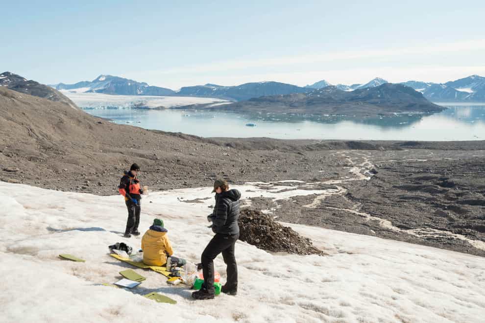 Emily with fellow member of the MicroLab team in Ny Alesund in Svalbard (Iain Rudkin/University of Bristol/PA)