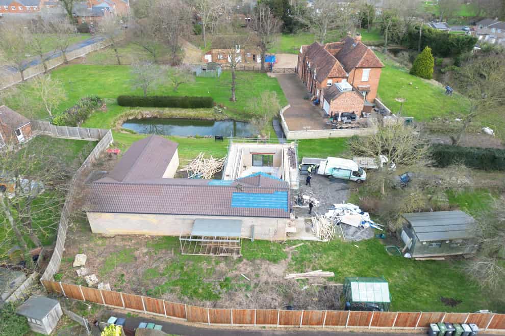 Work continues to demolish an unauthorised spa pool block at the home of Hannah Ingram-Moore, the daughter of the late Captain Sir Tom Moore, at Marston Moretaine, Bedfordshire. Picture date: Saturday February 3, 2024.