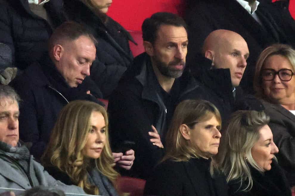 England boss Gareth Southgate and former Nottingham Forest Steve Cooper, left middle, watched Jordan Henderson’s Ajax debut (PA)