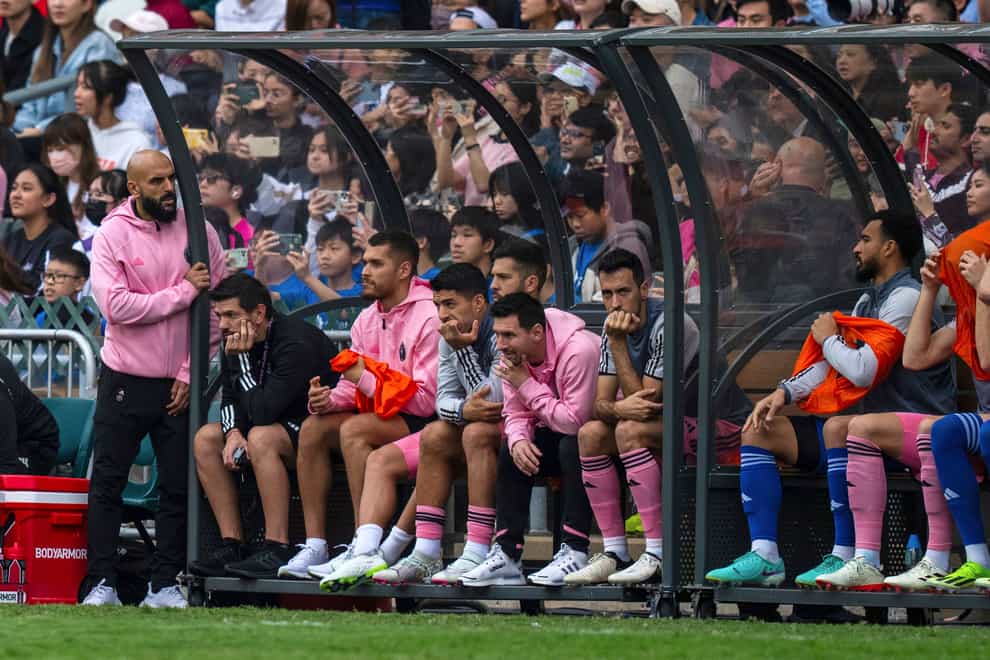 Inter Miami’s Lionel Messi, sixth from left, was left on the bench for his side’s friendly in Hong Kong (Louise Delmotte/AP)