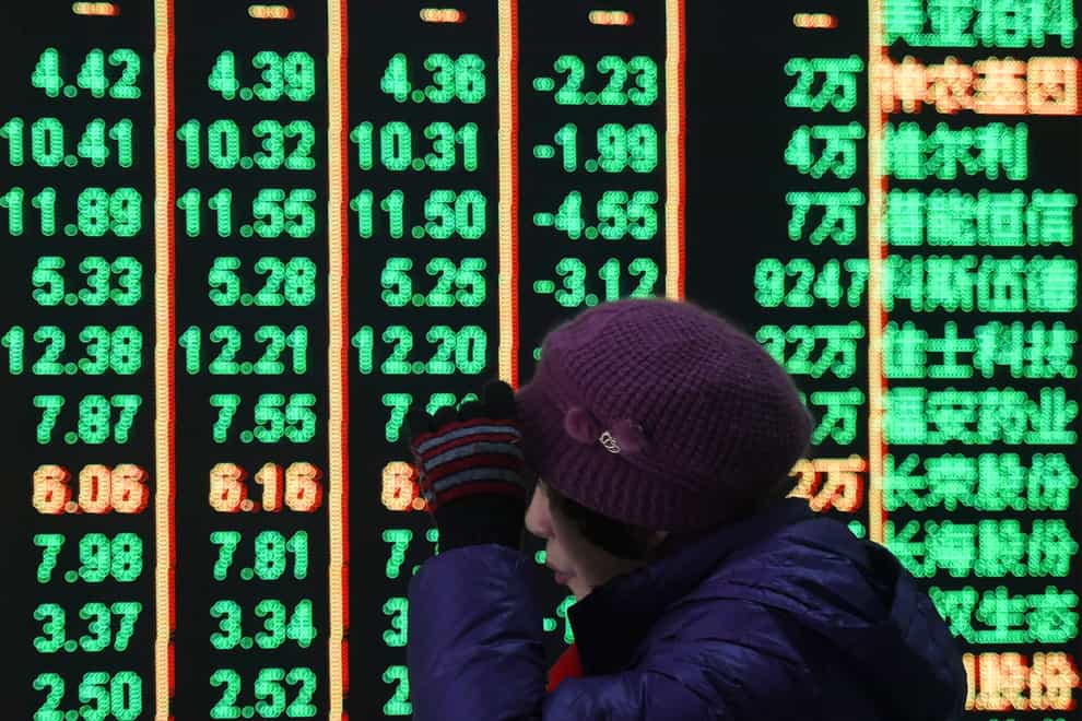 An electronic screen displaying stock prices at a brokerage house in Hangzhou in east China’s Zhejiang province on Monday (Chinatopix via AP)