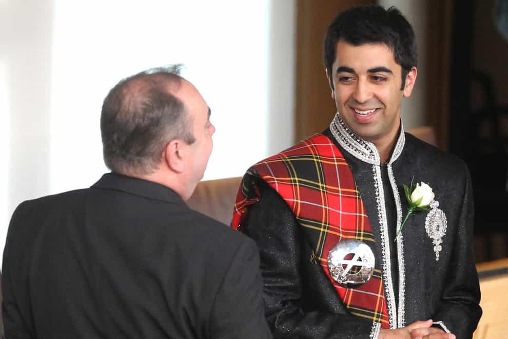 Former first minister Alex Salmond with current First Minister Humza Yousaf in 2011 (Andrew Milligan/PA)