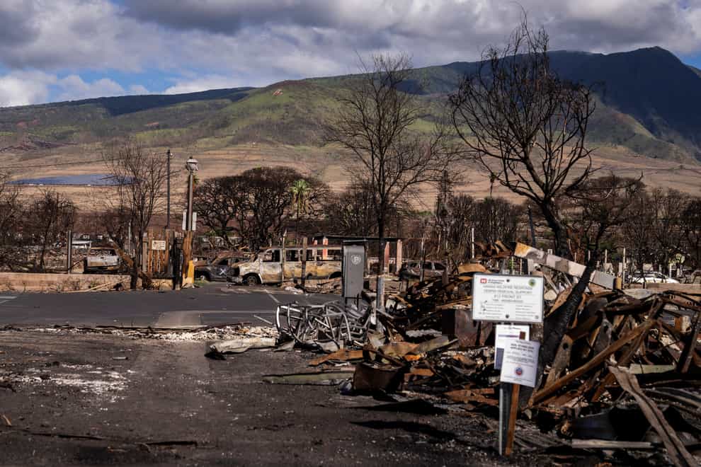 Debris of former shops and businesses in Lahaina, Hawaii, in December (Lindsey Wasson/AP)