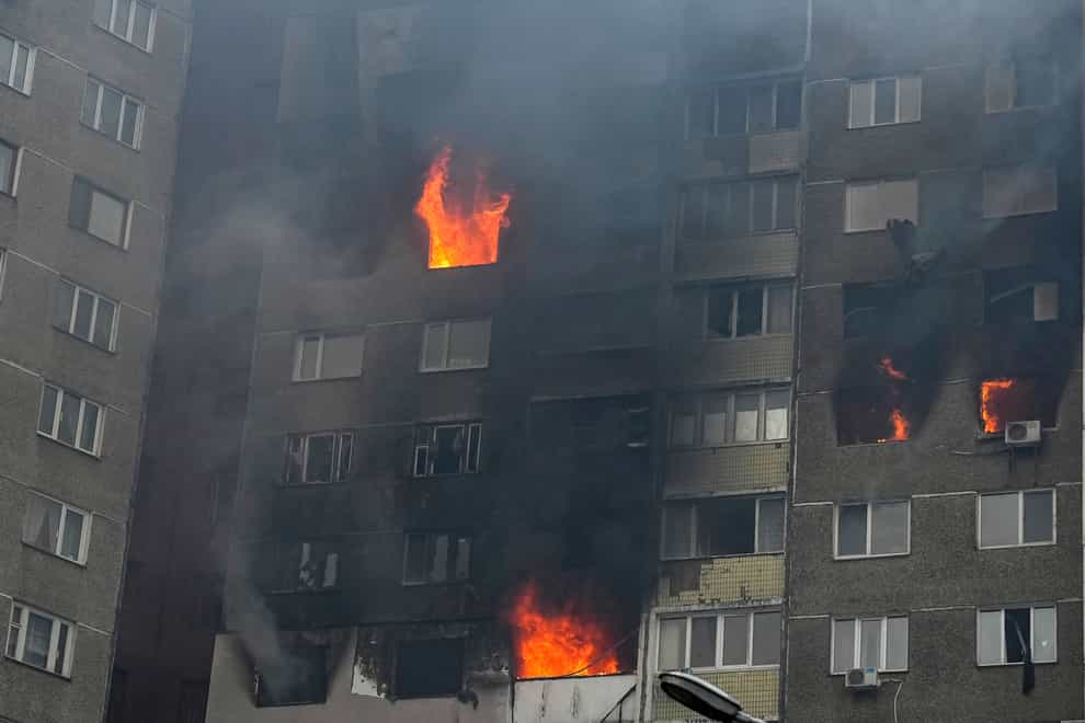 Fire and smoke rise out of an apartment building after a Russian attack in Kyiv, Ukraine (Efrem Lukatsky/AP)