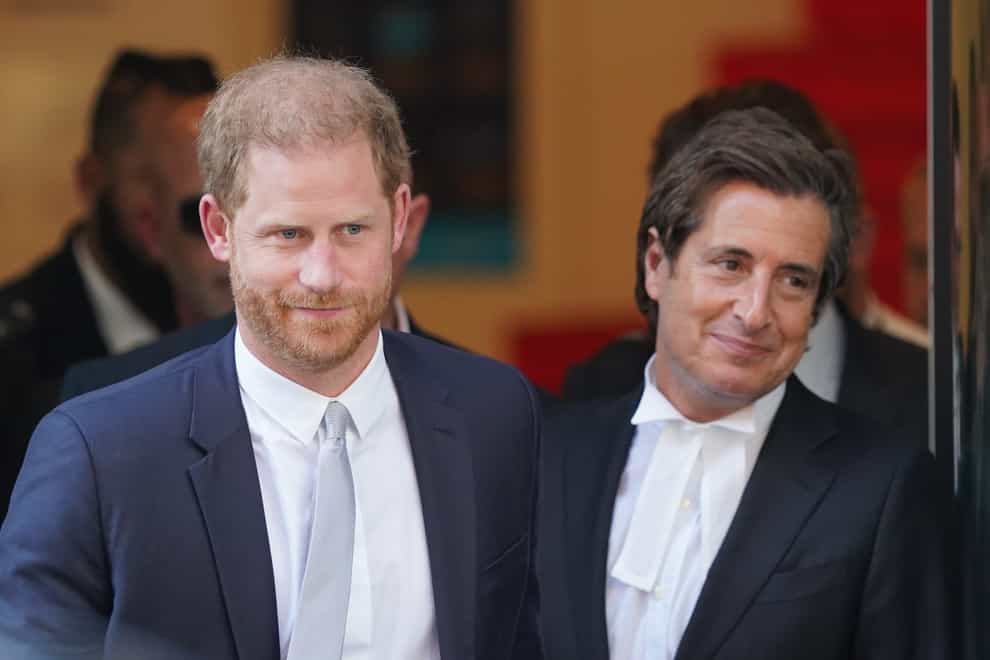 The Duke of Sussex (left) with his barrister, David Sherborne leaving the Rolls Buildings in central London after giving evidence in the phone hacking trial against Mirror Group Newspapers (MGN) last year (Jonathan Brady/PA)