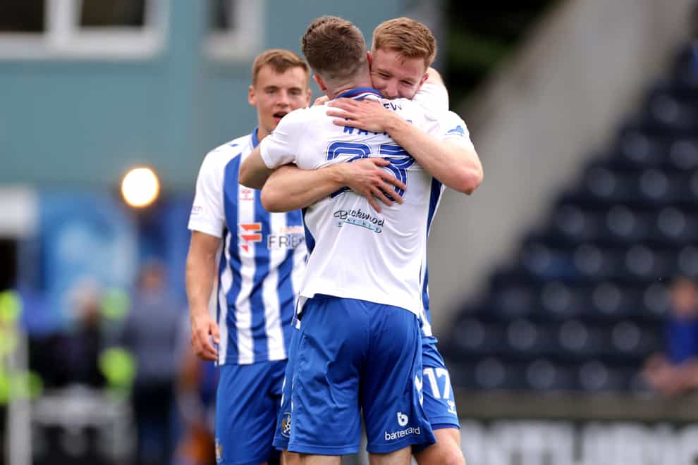 Kilmarnock’s Marley Watkins celebrates with team-mate after the final whistle in the Viaplay Cup second round match at The BBSP Stadium Rugby Park, Kilmarnock. Picture date: Sunday August 20, 2023.