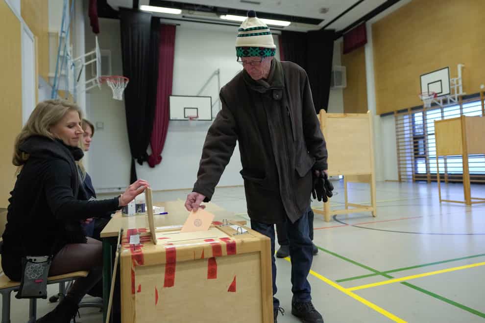 Voters in Finland are choosing between two experienced politicians to be their next president (Sergei Grits/AP)