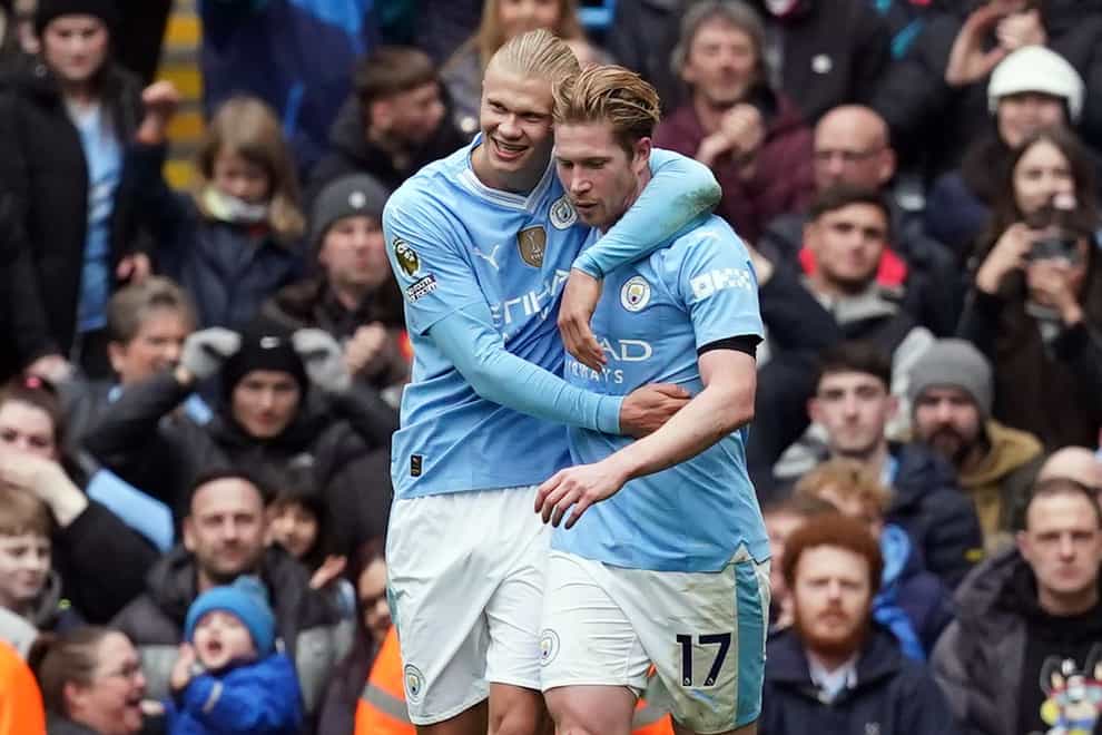 The return to form and fitness of Erling Haaland, left, and Kevin De Bruyne, right, puts Manchester City in a strong position (Martin Rickett/PA)