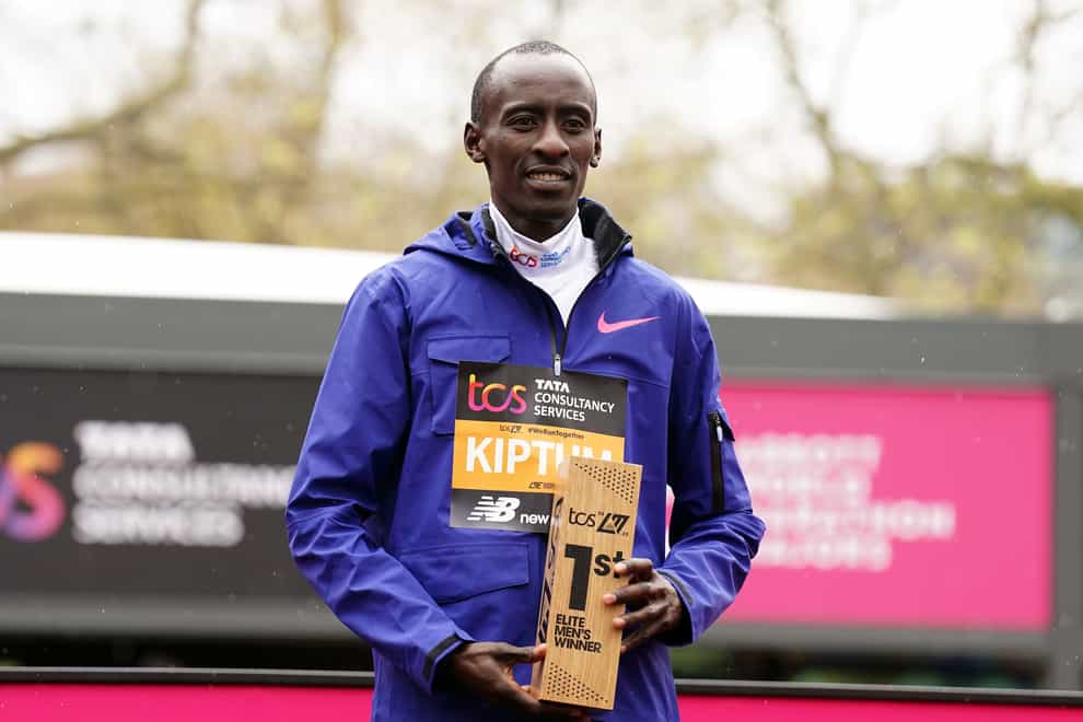 Kelvin Kiptum with the trophy after winning the Men’s elite race during the TCS London Marathon in 2023 (John Walton/PA)