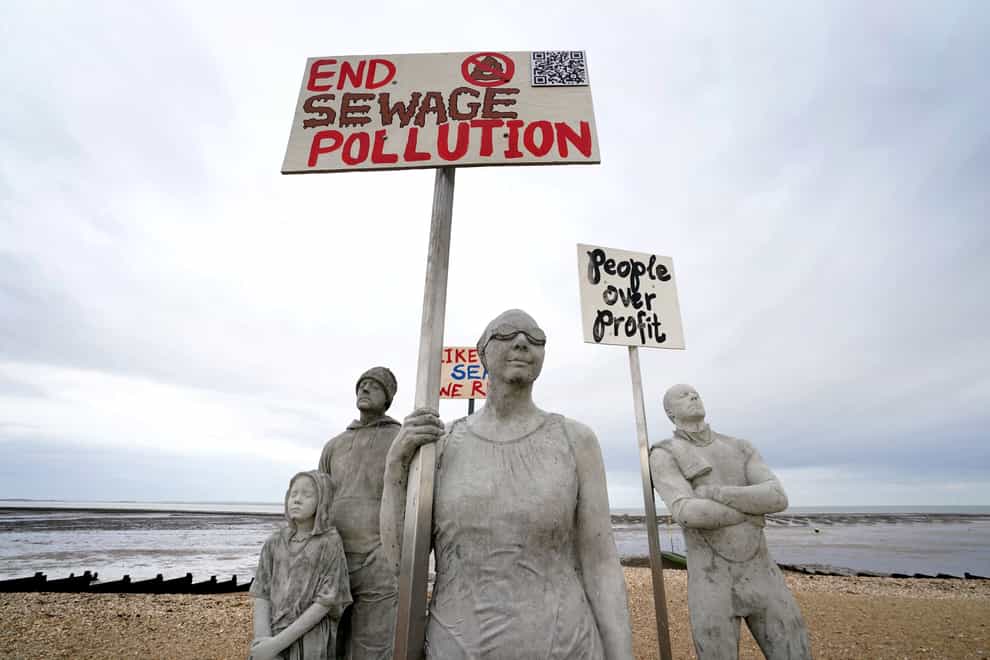 A view of art installation, Sirens of Sewage, by Jason DeCaires Taylor unveiled on the beach in Whitstable, Kent (Gareth Fuller/PA)
