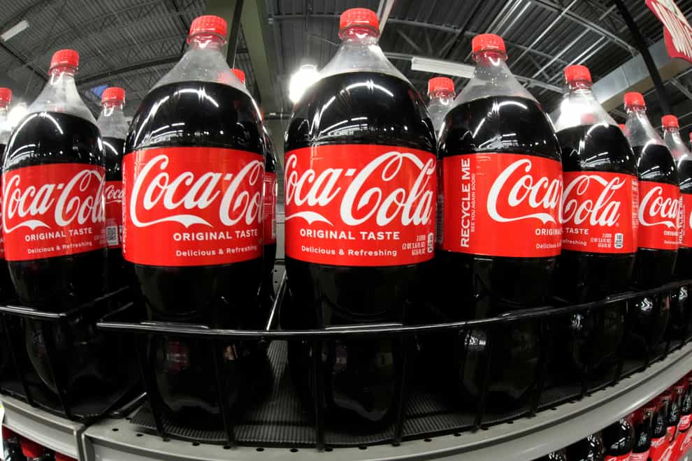 Coca-Cola reported higher-than-expected revenue in the fourth quarter as growth in Mexico, Germany and other markets offset lower sales in the US (Gene J Puskar/AP)