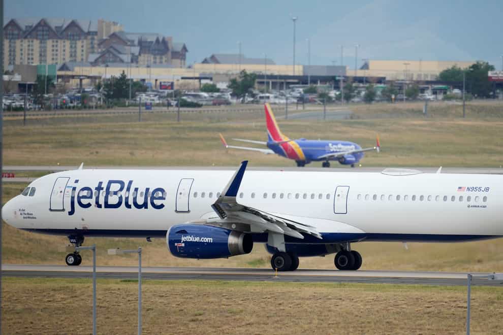 Shares in JetBlue rose more than 15% before the US market opened on Tuesday as activist investor Carl Icahn took an almost 10% stake in the airline (David Zalubowski/AP)