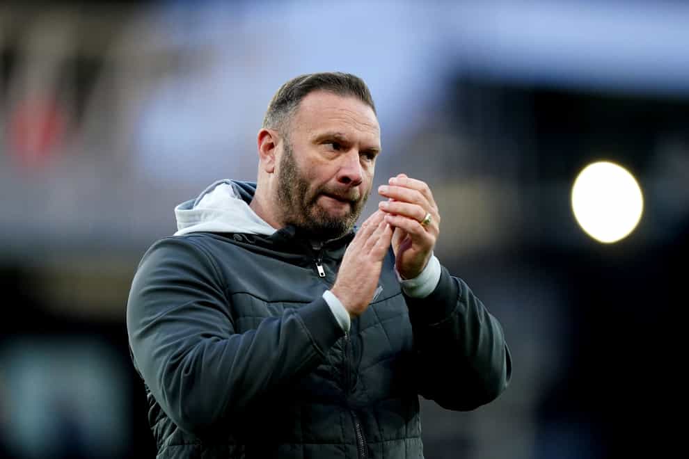 Bolton Wanderers’ Ian Evatt applauds the fans at the end of the Emirates FA Cup Third Round match at Kenilworth Road, Luton. Picture date: Sunday January 7, 2024.