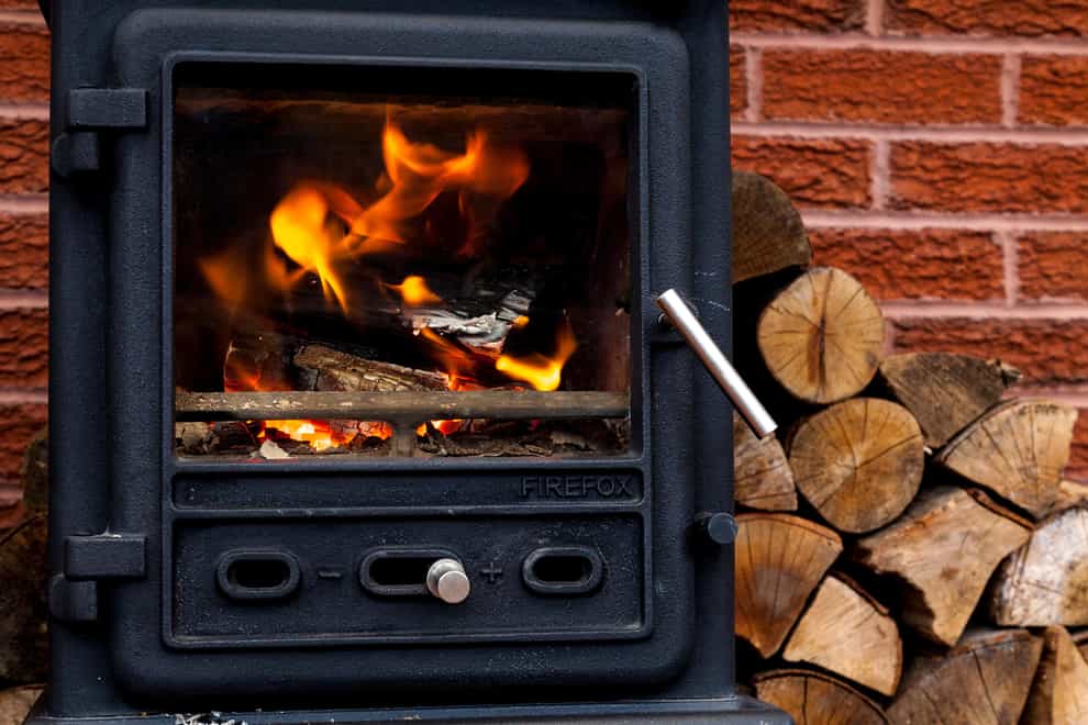 Increases in wood burners in homes and the use of biomass in industry have offset drops in pollution from cars and electricity generation, official figures show (Alamy/PA)