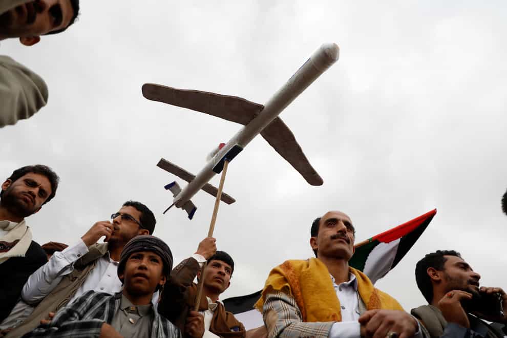Houthi supporters attend a rally against the US-led strikes against Yemen and in the support of Palestinians in the Gaza Strip, in Sanaa, Yemen (Osamah Abdulrahman/AP)