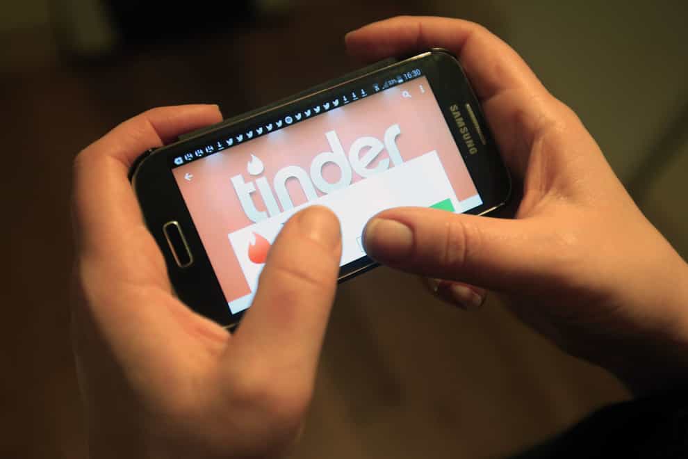 Tinder users can now confirm their identity, age and likeness on the app to get a verified tick on their profile (Jonathan Brady/PA)