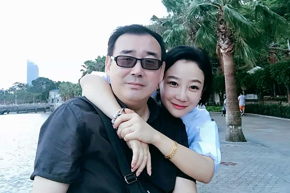 Yang Hengjun, left, and his wife Yuan Xiaoliang (Chongyi Feng via AP, File)