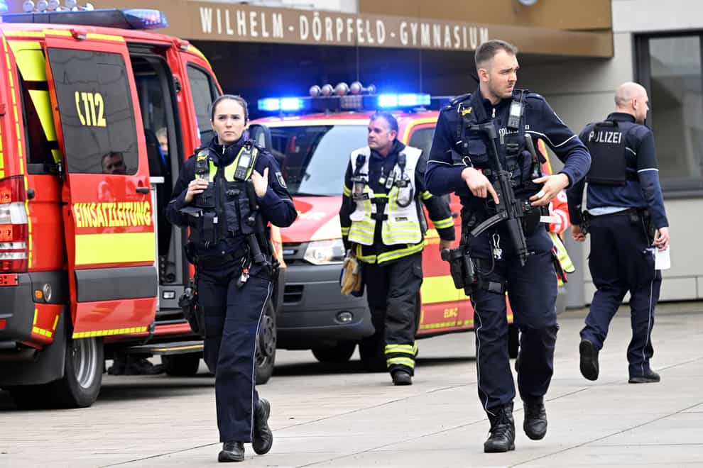 Police and ambulances at the scene of the attack in Wuppertal (Roberto Pfeil/dpa via AP/PA)