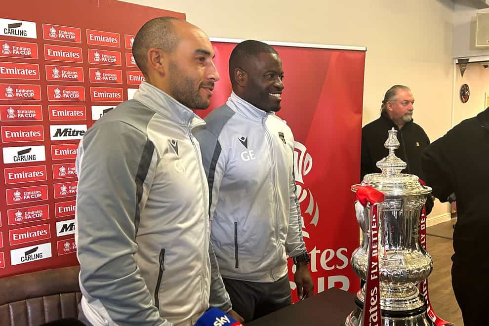 Maidstone manager George Elokobi (centre) and assistant Craig Fagan pose with the FA Cup (Andy Sims/PA)