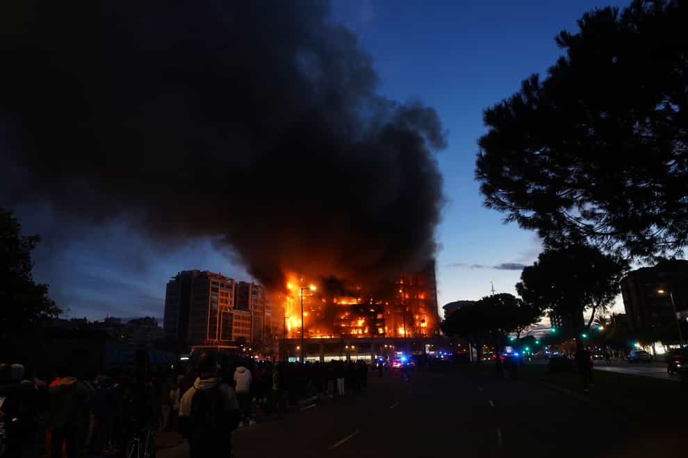 A housing block burns in Valencia, Spain (Alberto Saiz/AP)