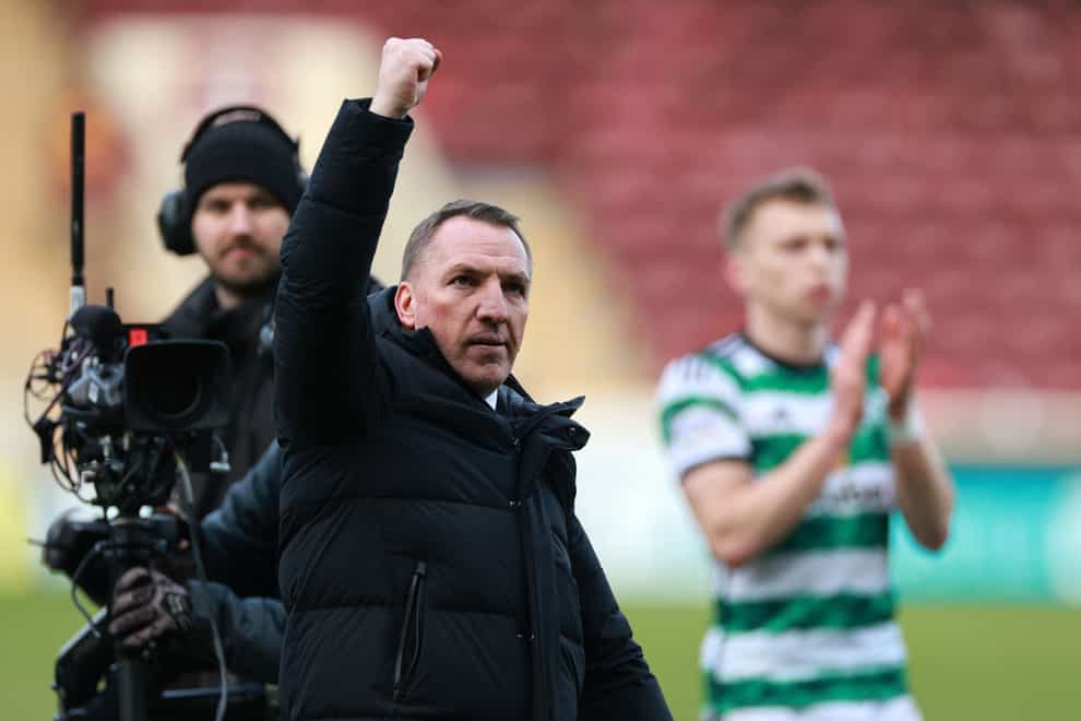 Celtic manager Brendan Rodgers celebrates following a dramatic finale (Steve Welsh/PA)