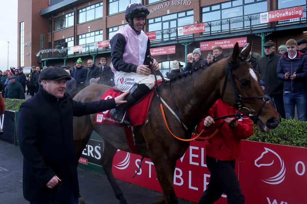 Gordon Elliott greets Jack Kennedy and Teahupoo following their Hatton’s Grace victory (Brian Lawless/PA)