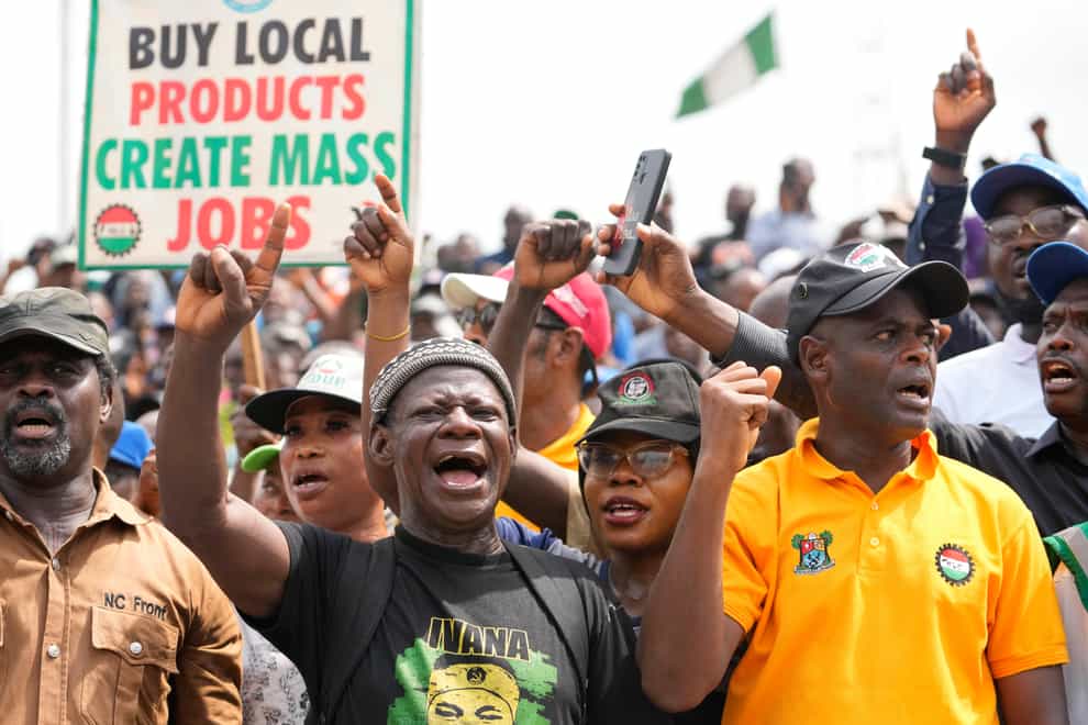 Union members march to protest over economic hardship in Lagos, Nigeria (AP Photo/Sunday Alamba)