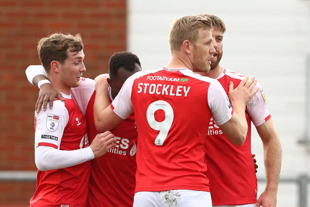 Jayden Stockley (second right) scored two late goals for Fleetwood (Tim Markland/PA)