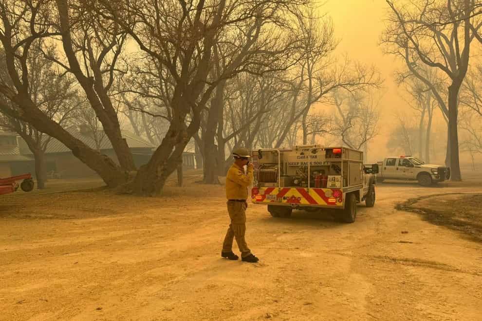 Rapidly moving Texas wildfires on Tuesday prompted evacuation orders in small towns and shut down a nuclear facility (Flower Mound Fire Department via AP)