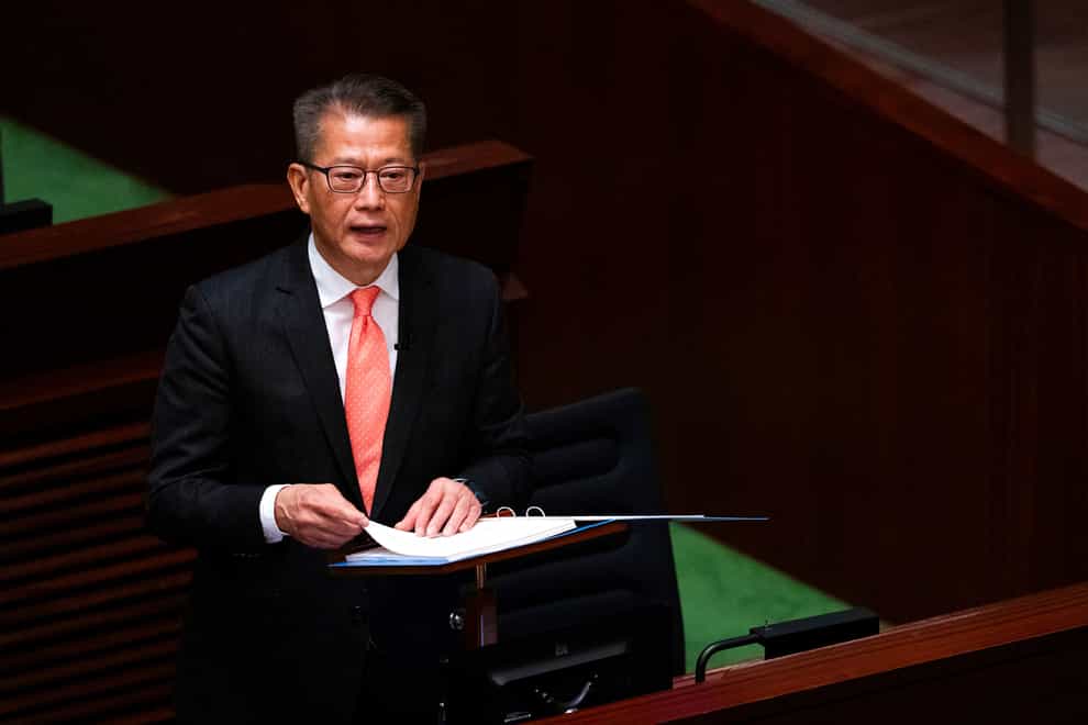 Hong Kong’s Finance Secretary Paul Chan delivers the annual budget address (AP)