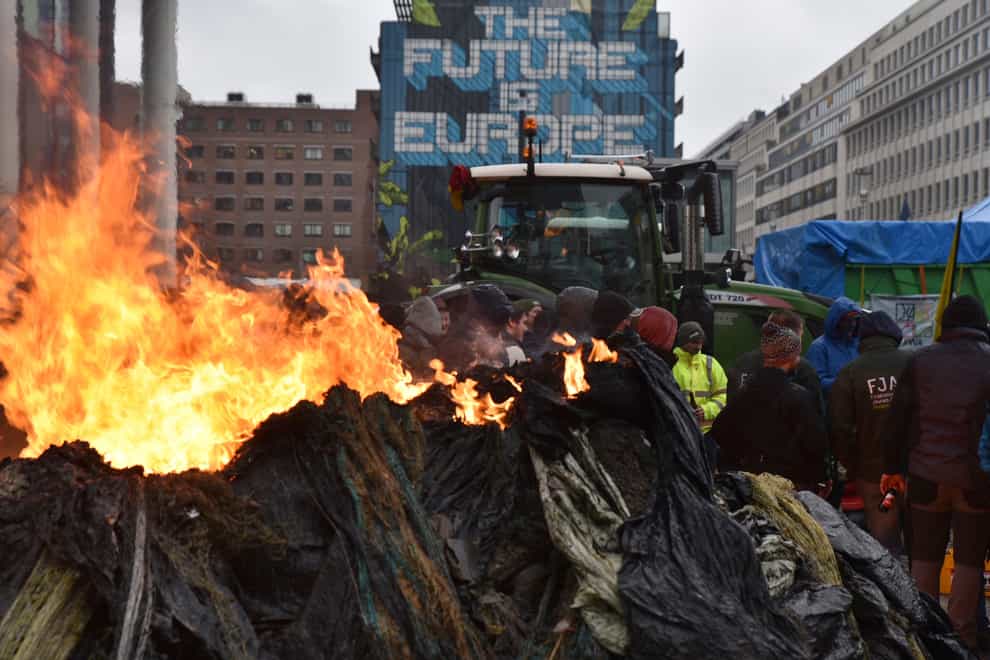 Farmers have demonstrated in the European Quarter outside a meeting of EU agriculture ministers in Brussels (AP)