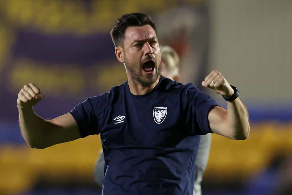 AFC Wimbledon manager Johnnie Jackson was delighted with his side’s last-gasp win (Steven Paston/PA)