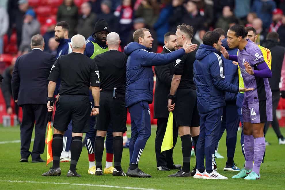 Referee Paul Tierney is surrouned by Nottingham Forest players and staff (Mike Egerton/PA).
