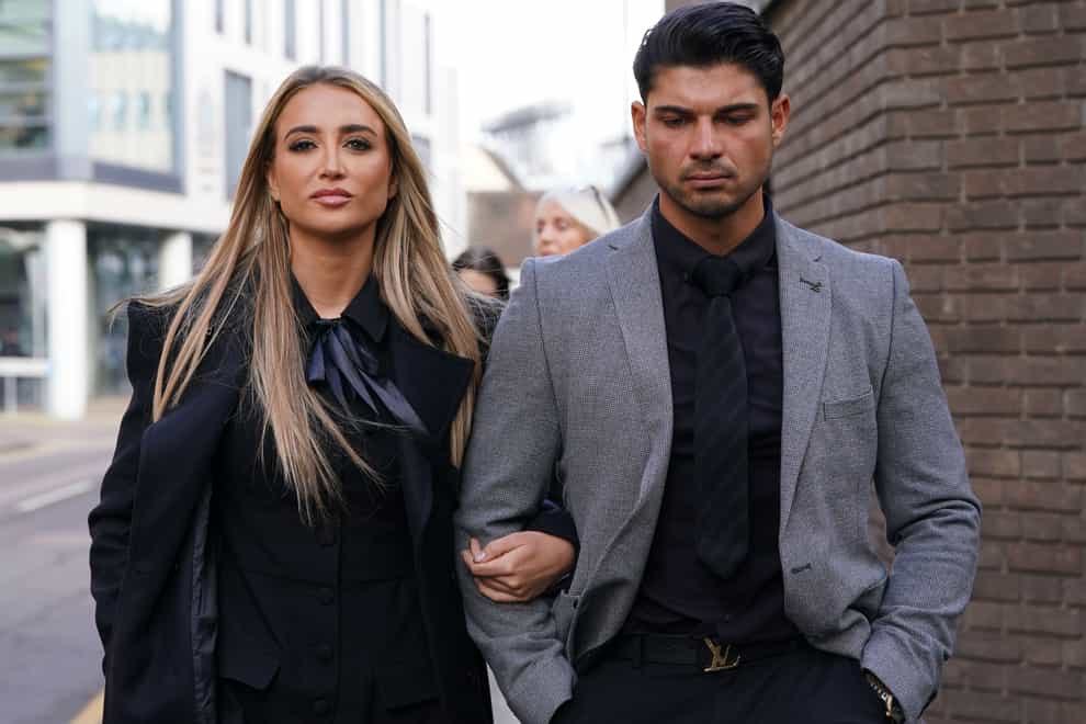 Georgia Harrison and Anton Danyluk arrive at Chelmsford Crown Court for Stephen Bear’s confiscation hearing (Lucy North/PA)